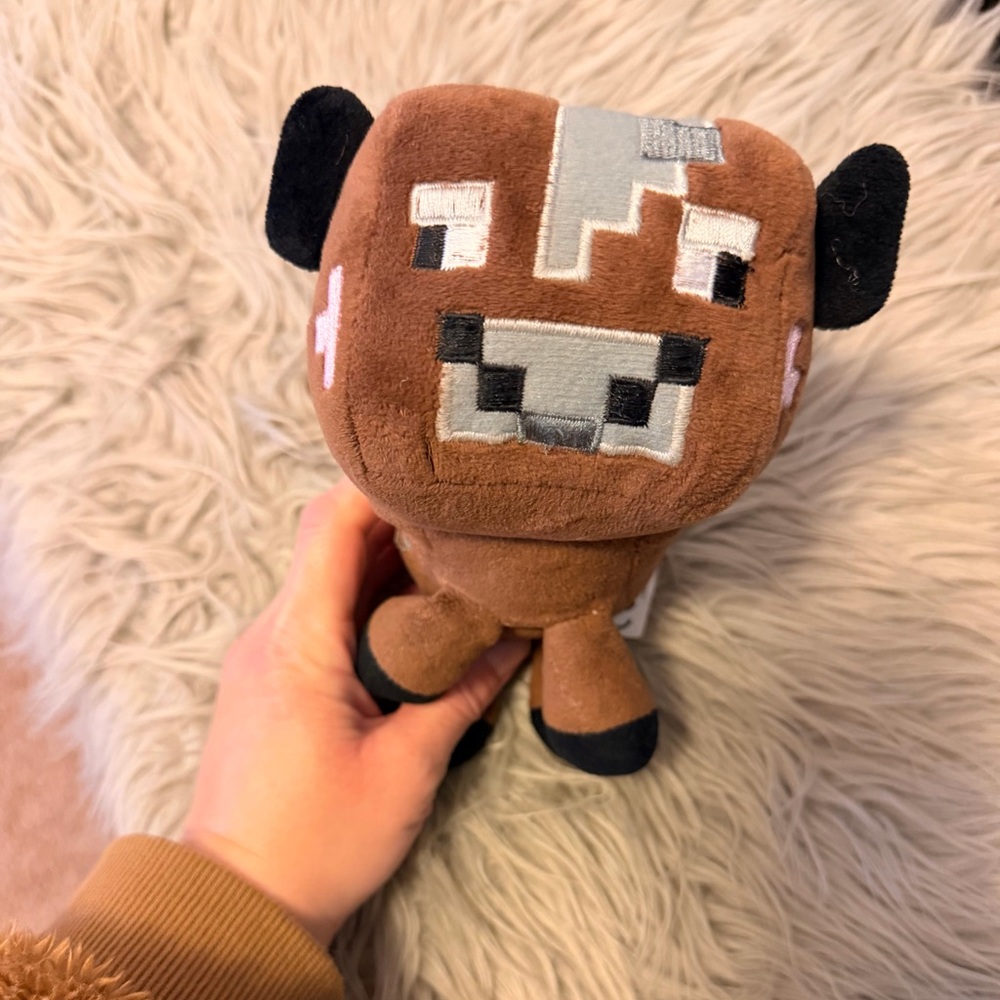 Pixelated Brown and Black Plush Toy
